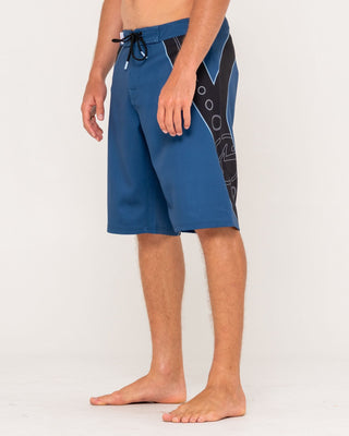Man wearing Stingray Fixed Waist Boardshort in Atlantic Blue