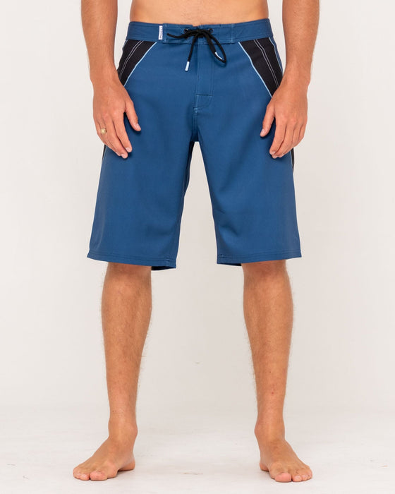 man-wearing-stingray-fixed-waist-boardshort-in-atlantic-blue