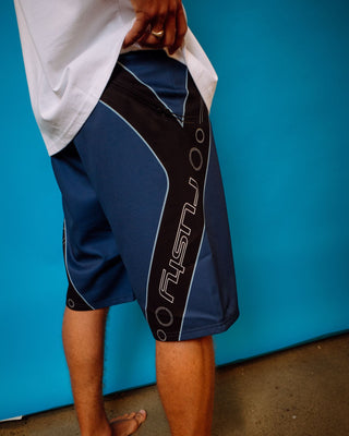 Man wearing Stingray Fixed Waist Boardshort in Atlantic Blue