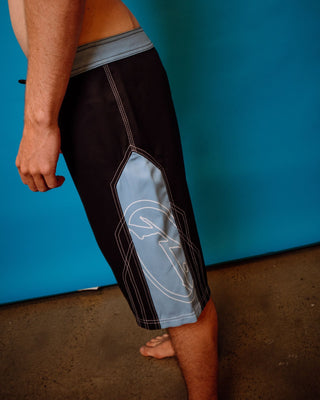 Man wearing Tombstones Fixed Waist Boardshort in Black