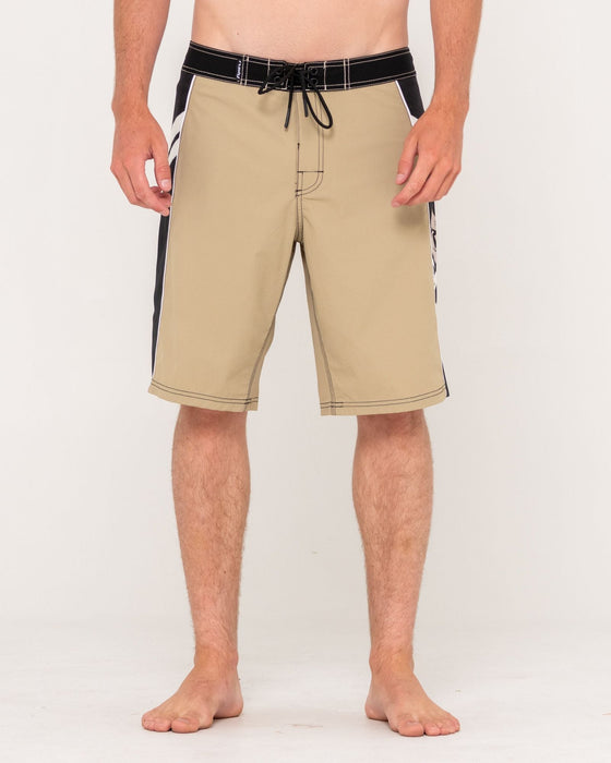 man-wearing-stone-cold-fixed-waist-boardshort-in-abbey-stone