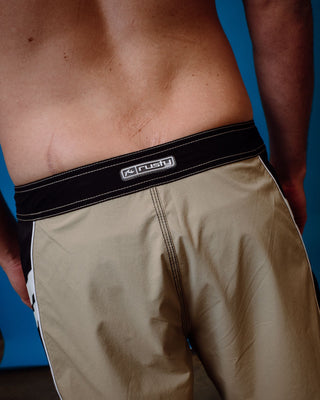 Man wearing Stone Cold Fixed Waist Boardshort in Abbey Stone