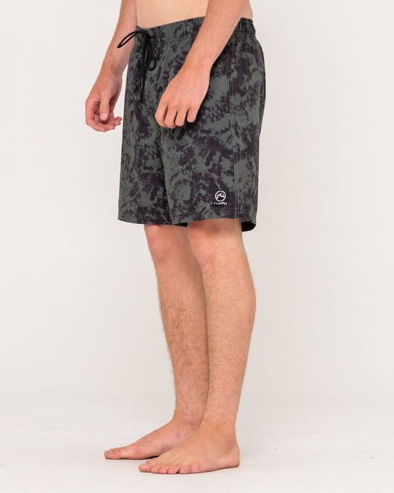 man-wearing-all-over-elastic-waist-boardshort-in-army-green