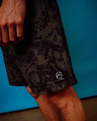 Man wearing All Over Elastic Waist Boardshort in Army Green