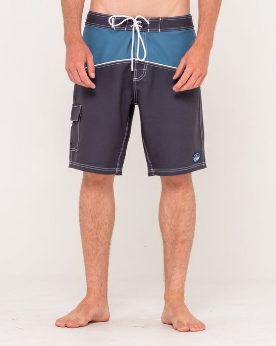 man-wearing-accelerator-fixed-waist-boardshort-in-coal