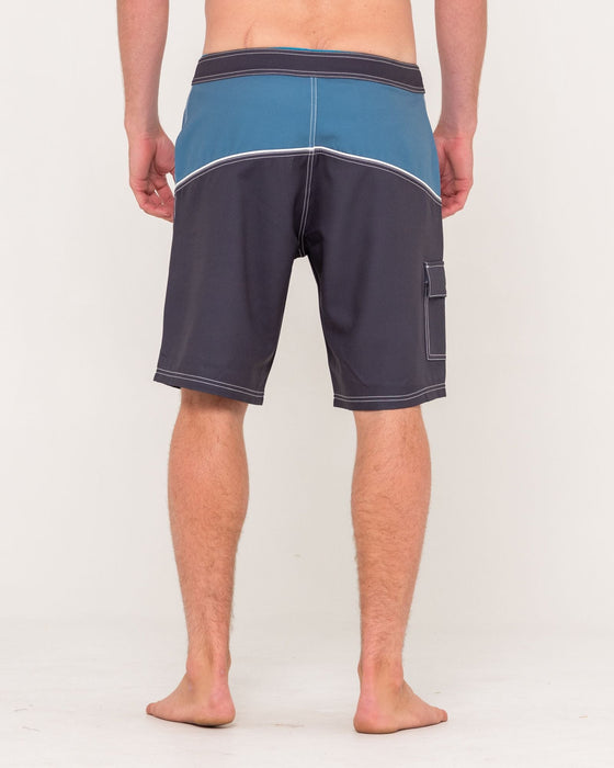 man-wearing-accelerator-fixed-waist-boardshort-in-coal