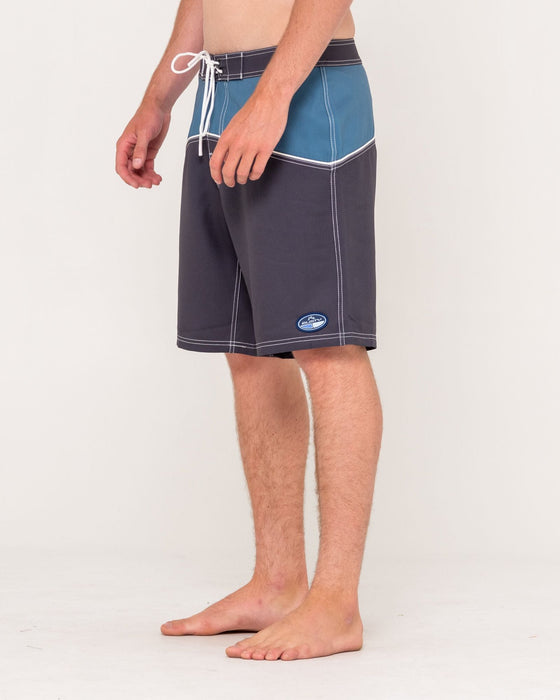 man-wearing-accelerator-fixed-waist-boardshort-in-coal