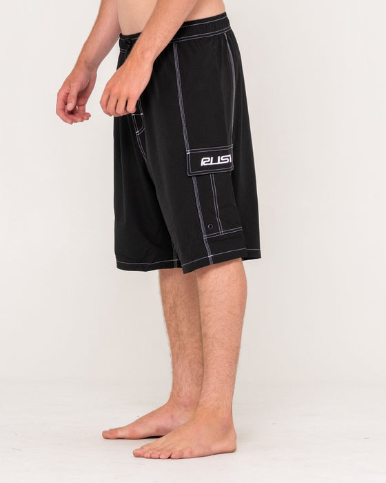 man-wearing-pick-pocket-elastic-waist-boardshort-in-black
