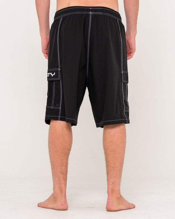 man-wearing-pick-pocket-elastic-waist-boardshort-in-black