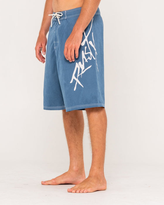 man-wearing-hoodus-fixed-waist-boardshort-in-china-blue