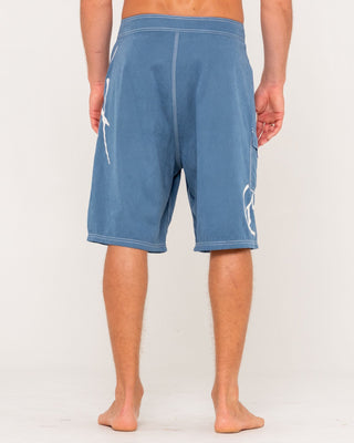 Man wearing Hoodus Fixed Waist Boardshort in China Blue