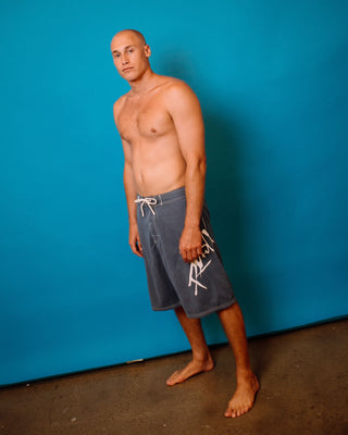 Man wearing Hoodus Fixed Waist Boardshort in China Blue
