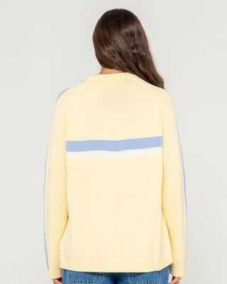 Woman wearing White Lines Long Sleeve Crew Neck Knit in Pale Banana / Retro Blue