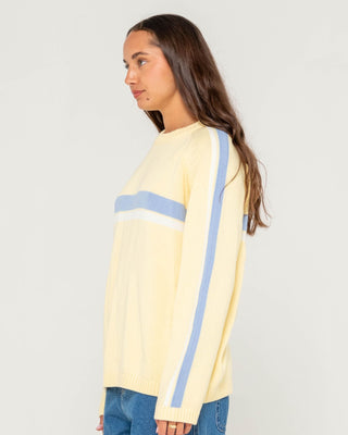 Woman wearing White Lines Long Sleeve Crew Neck Knit in Pale Banana / Retro Blue