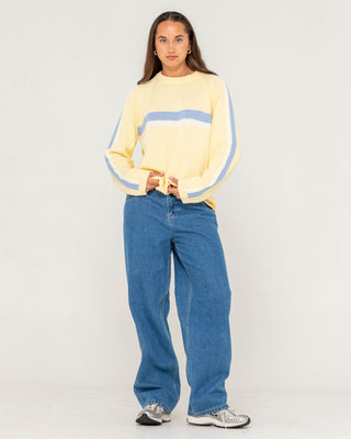 Woman wearing White Lines Long Sleeve Crew Neck Knit in Pale Banana / Retro Blue