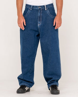 Man wearing Flip Daddy Tapeless Jean - Deep Sea Blue in Deep Sea Blue