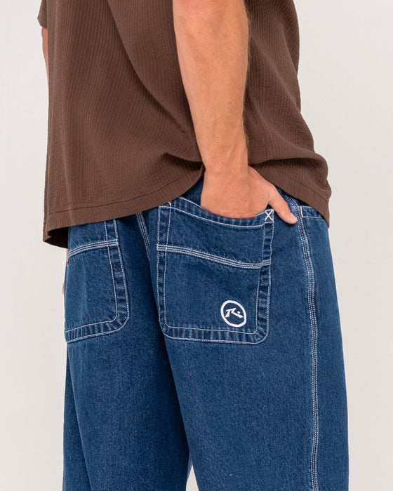 man-wearing-flip-daddy-tapeless-jean-deep-sea-blue-in-deep-sea-blue