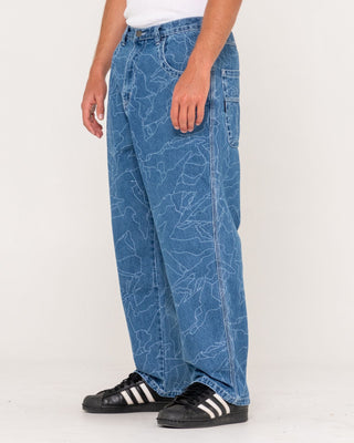 Man wearing Flip Daddy Lazer Tech Denim Jean in Middy Blue