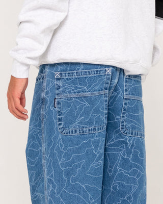 Man wearing Flip Daddy Lazer Tech Denim Jean in Middy Blue