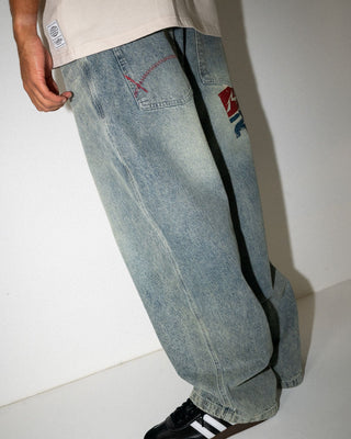 Man wearing Stone Cold Denim Jean in Dirty Dawg