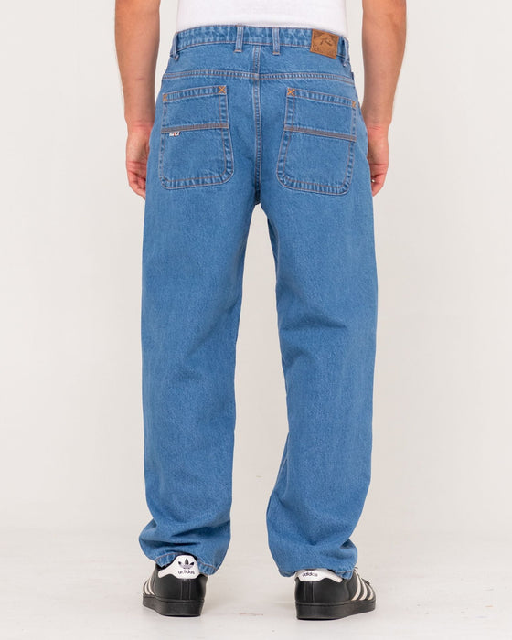man-wearing-lucifer-loose-jean-middy-blue-in-middy-blue