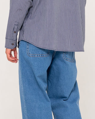 Man wearing Lucifer Loose Jean - Middy Blue in Middy Blue