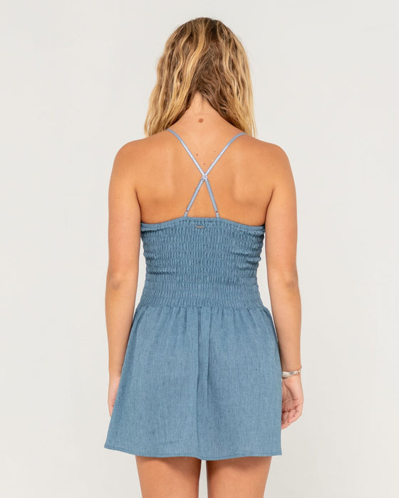 woman-wearing-mimi-smocked-mini-dress-in-retro-blue