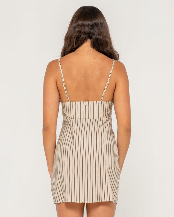 woman-wearing-sandy-stripe-mini-dress-in-oatmeal-stripe
