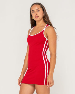 Woman wearing Ashley Ribbed Mini Dress in Red