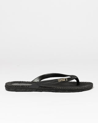 Woman wearing Flip Out Thong in Black 2