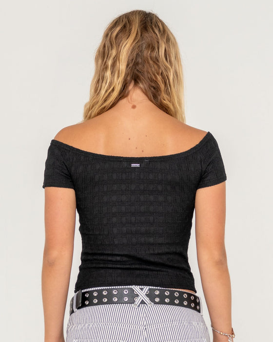 woman-wearing-ciao-bella-off-shoulder-top-in-black