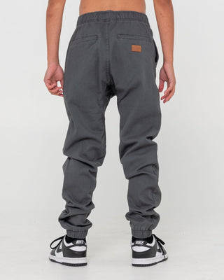 Boy wearing Hook Out Elastic Pant Boys in Pavement