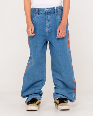 Boy wearing Flip Daddy 2.0 Jean Boys-middy Blue in Middy Blue