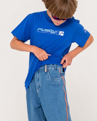 Boy wearing Flip Daddy 2.0 Jean Boys-middy Blue in Middy Blue