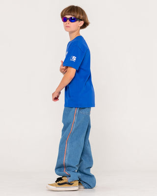 Boy wearing Flip Daddy 2.0 Jean Boys-middy Blue in Middy Blue
