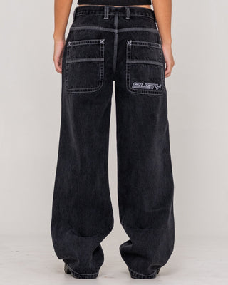 Woman wearing Flip Mommy Low Rise Wide Leg Denim Jean in Black Out