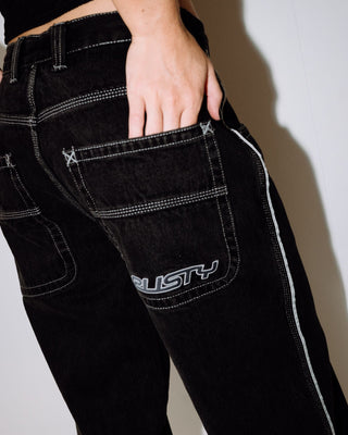 Woman wearing Flip Mommy Low Rise Wide Leg Denim Jean in Black Out