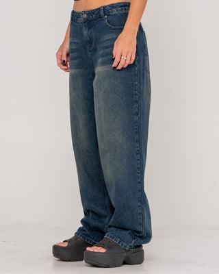 Woman wearing Bethany Baggy Low Rise Jean in Dark N Dirty