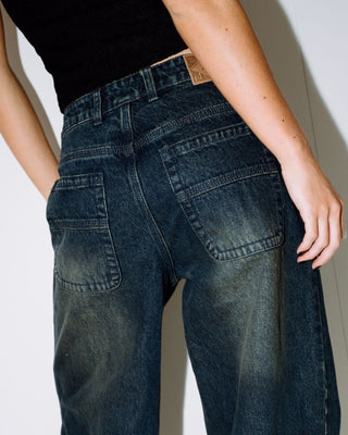 Woman wearing Bethany Baggy Low Rise Jean in Dark N Dirty
