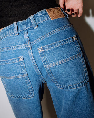 Woman wearing Bethany Baggy Low Rise Jean in Middy Blue