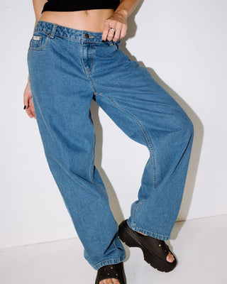 Woman wearing Bethany Baggy Low Rise Jean in Middy Blue