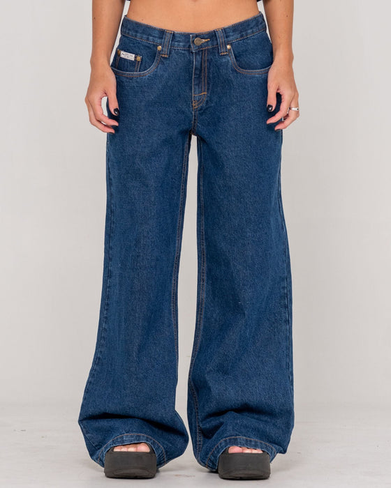 woman-wearing-wendy-wide-low-rise-denim-jean-in-deep-sea-blue