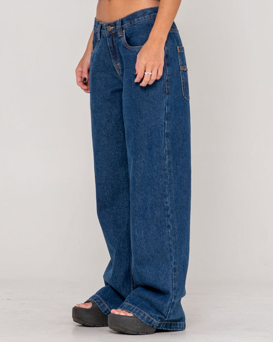 woman-wearing-wendy-wide-low-rise-denim-jean-in-deep-sea-blue