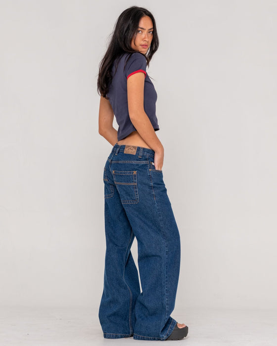 woman-wearing-wendy-wide-low-rise-denim-jean-in-deep-sea-blue