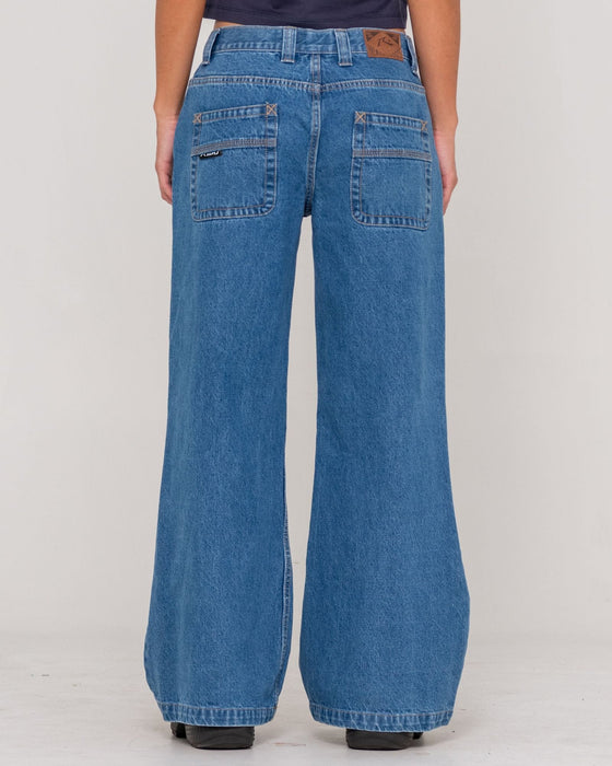woman-wearing-wendy-wide-low-rise-denim-jean-in-middy-blue