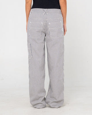 Woman wearing Worldwide Low Rise Pant in Navy Stripe