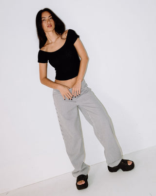 Woman wearing Worldwide Low Rise Pant in Navy Stripe