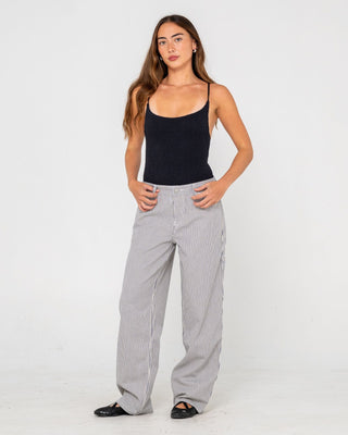 Woman wearing Worldwide Low Rise Pant in Navy Stripe