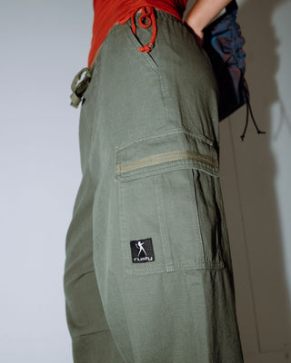 Woman wearing River Low Rise Baggy Cargo Pant in Shadow Army