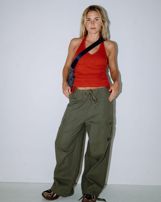 Woman wearing River Low Rise Baggy Cargo Pant in Shadow Army